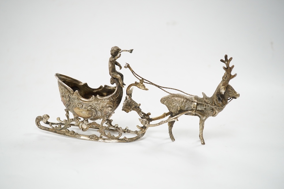 A modern continental silver sleigh with putto and reindeer, import marks for London, 1974, 16cm. Condition - poor